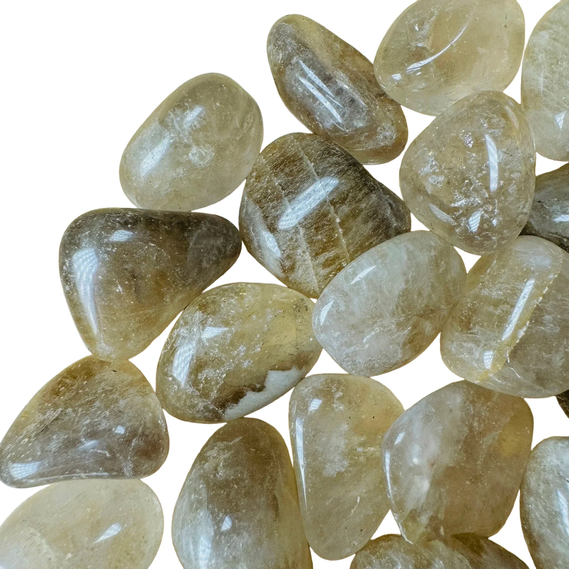 Top-down shot of Natural Citrine tumbled stone, sourced from Brazil.