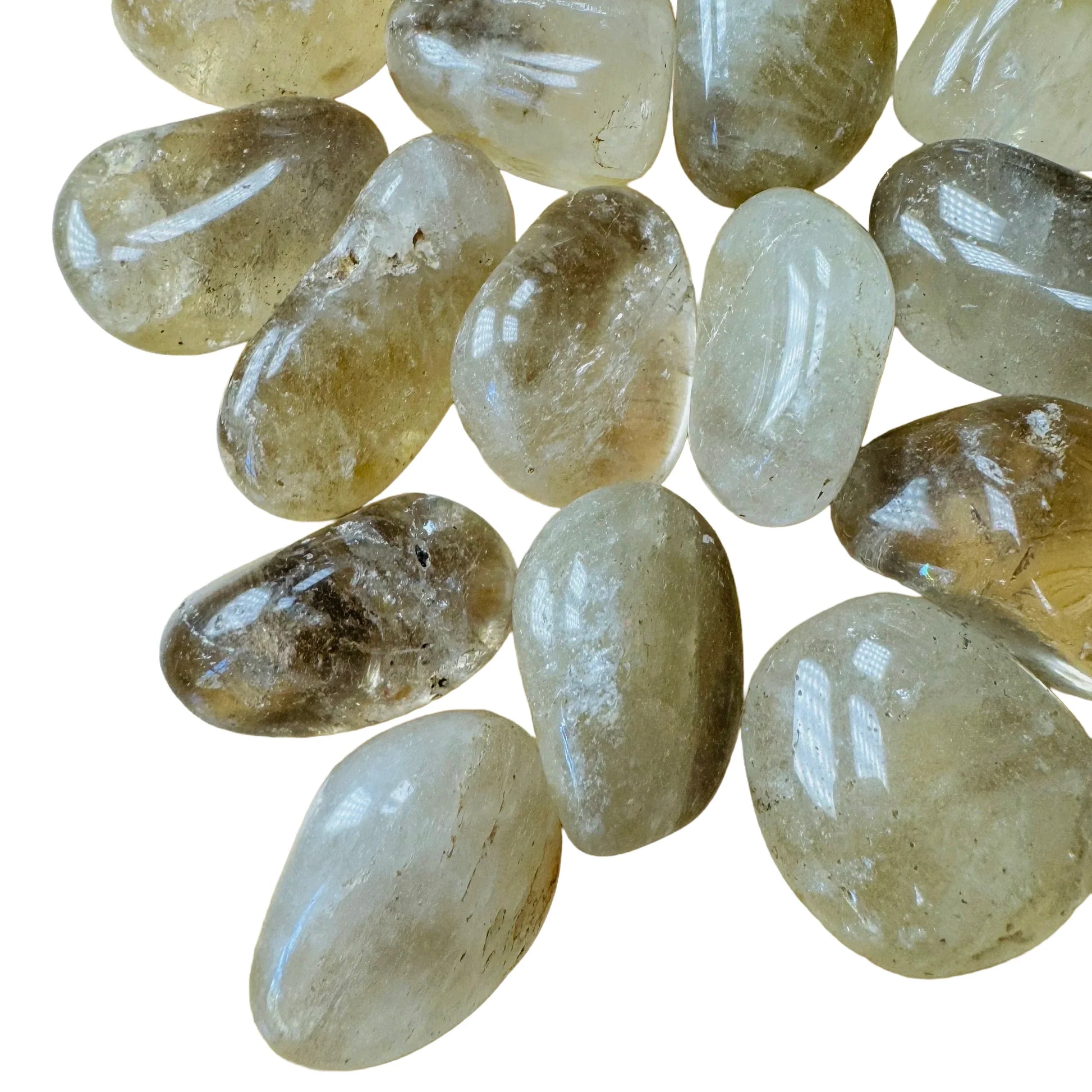 Near view of Natural Citrine tumbled stone, showing characteristic color, Brazil-sourced.