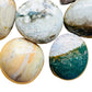 Close-up of Grade AA Ocean Jasper palm stone, from Sofia, Madagascar, kept near for Emotional Healing and Stress Relief.
