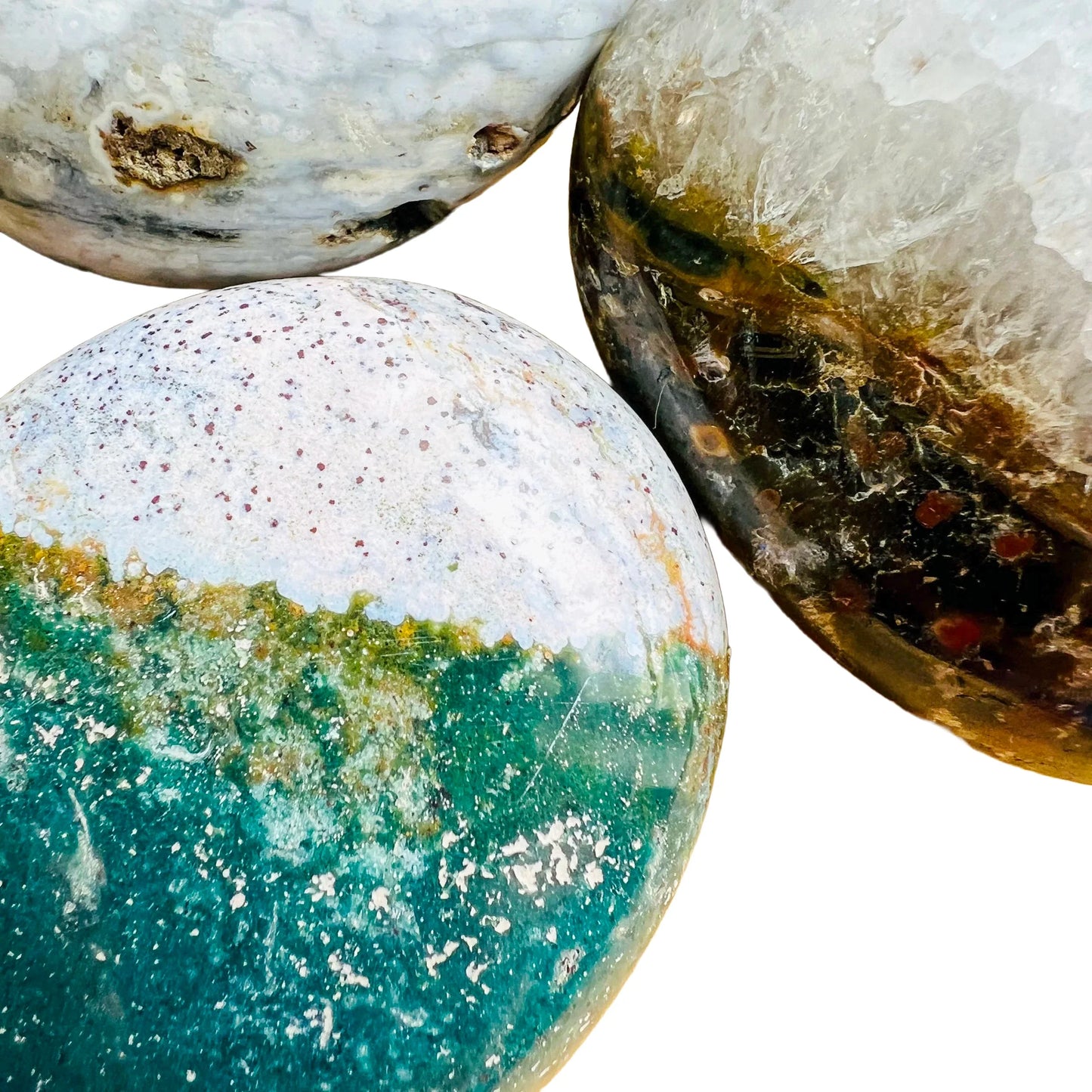 Top-side view of green Ocean Jasper palm stone, traditionally used for Emotional Healing and Stress Relief.