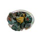 Up-close view of Ocean Jasper raw stone, sourced from Madagascar, often kept for Emotional Healing.