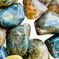 Close detail of Ocean Jasper tumbled stone, showing subtle veining.