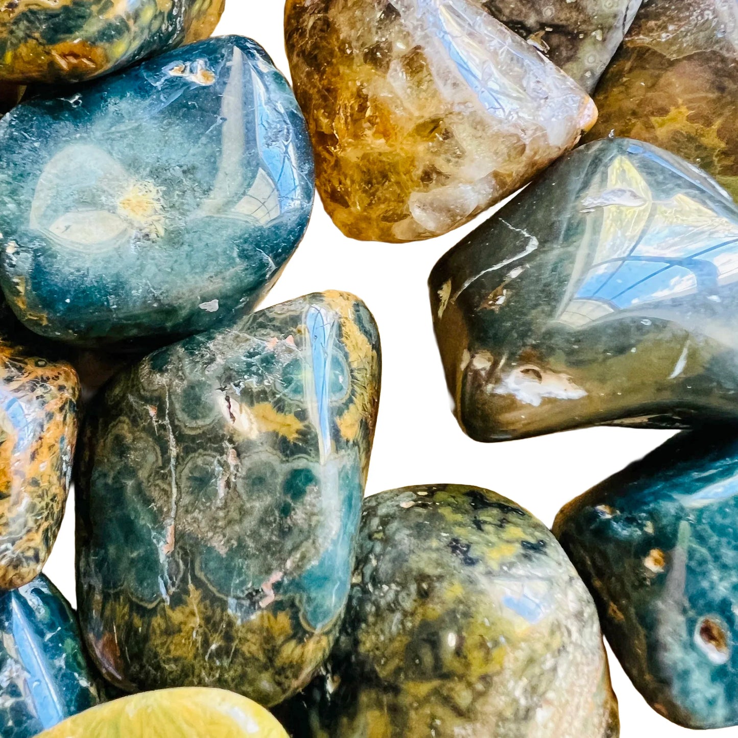 Close detail of Ocean Jasper tumbled stone, showing subtle veining.