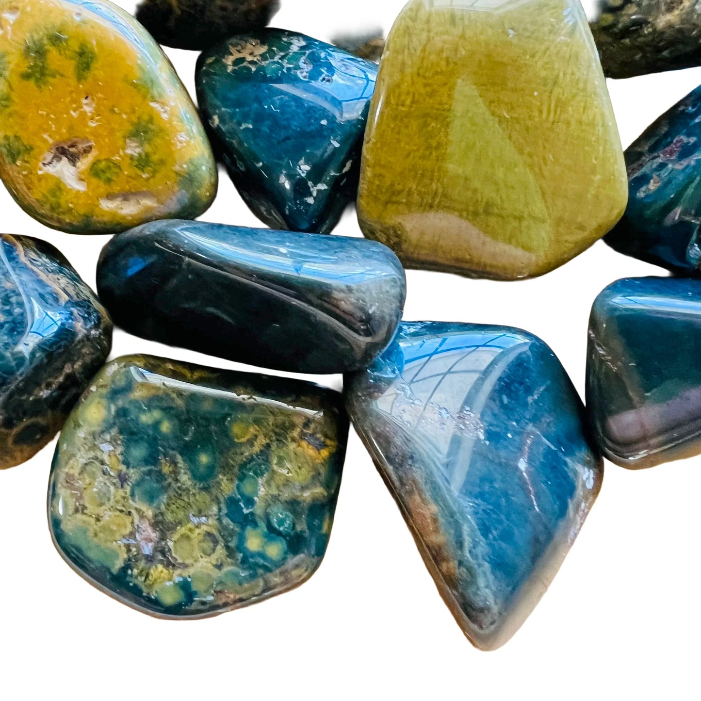 Underside view of Ocean Jasper tumbled stone, sourced from Sofia, Madagascar.