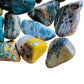 Top angle of Ocean Jasper tumbled stone, showing characteristic color.