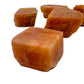 Top-side view of Orange Calcite raw stone, from Namibia, showing natural color depth.