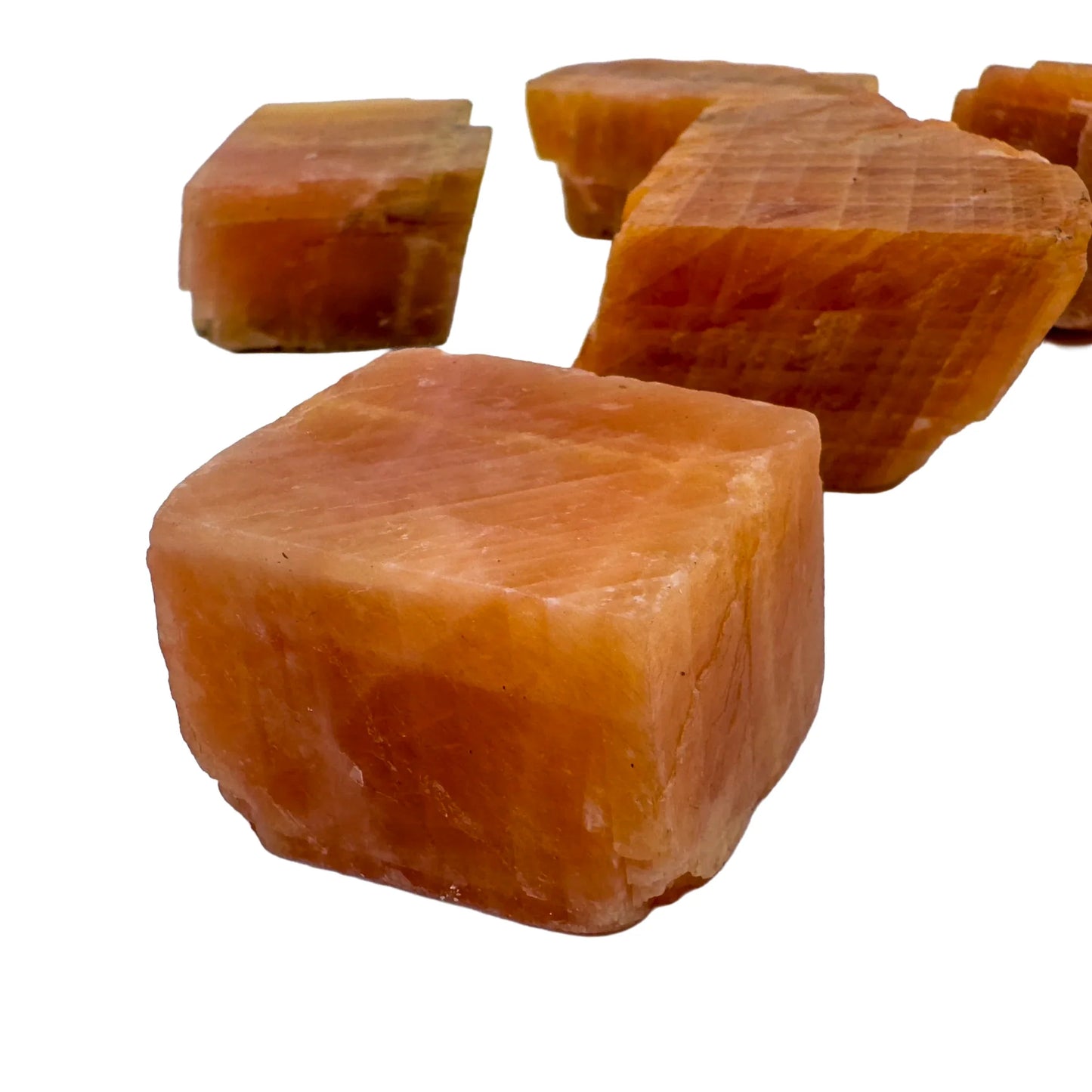 Top-side view of Orange Calcite raw stone, from Namibia, showing natural color depth.