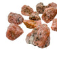 Looking down on Orange Calcite raw stone, showing natural color depth, often worked with for Energy.