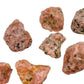Lifestyle view of a Orange Calcite raw stone often paired with practices around Energy and Creativity, sourced from Betsiboka.