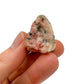 Soft-light view of Orange Calcite raw crystal, linked to Energy, with form visible in context.