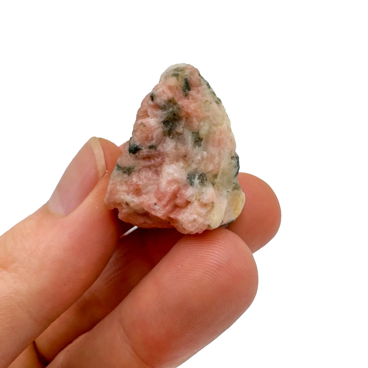 Soft-light view of Orange Calcite raw crystal, linked to Energy, with form visible in context.