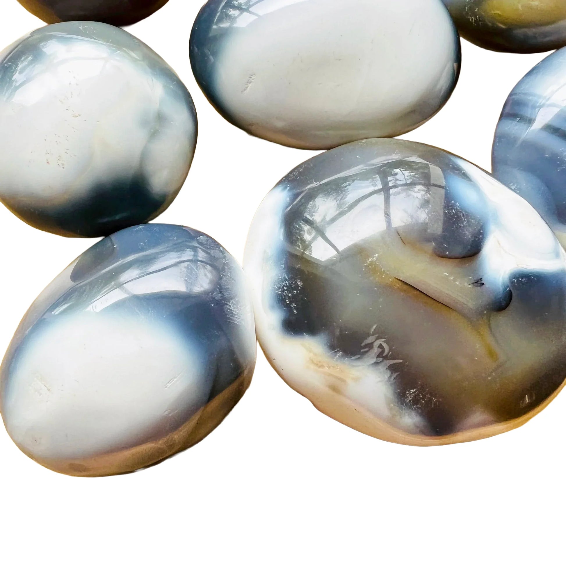 Color detail of Grade AA Orca Agate palm stone, often kept for Stress Relief and Emotional Healing, from Sofia, Madagascar.