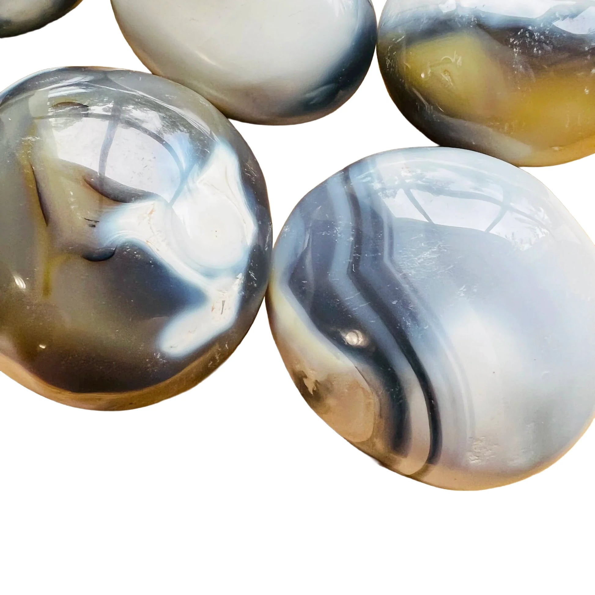 Top angle of Orca Agate palm stone, often kept for Stress Relief.