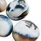 Alternate angle of Orca Agate palm stone, showing subtle veining.