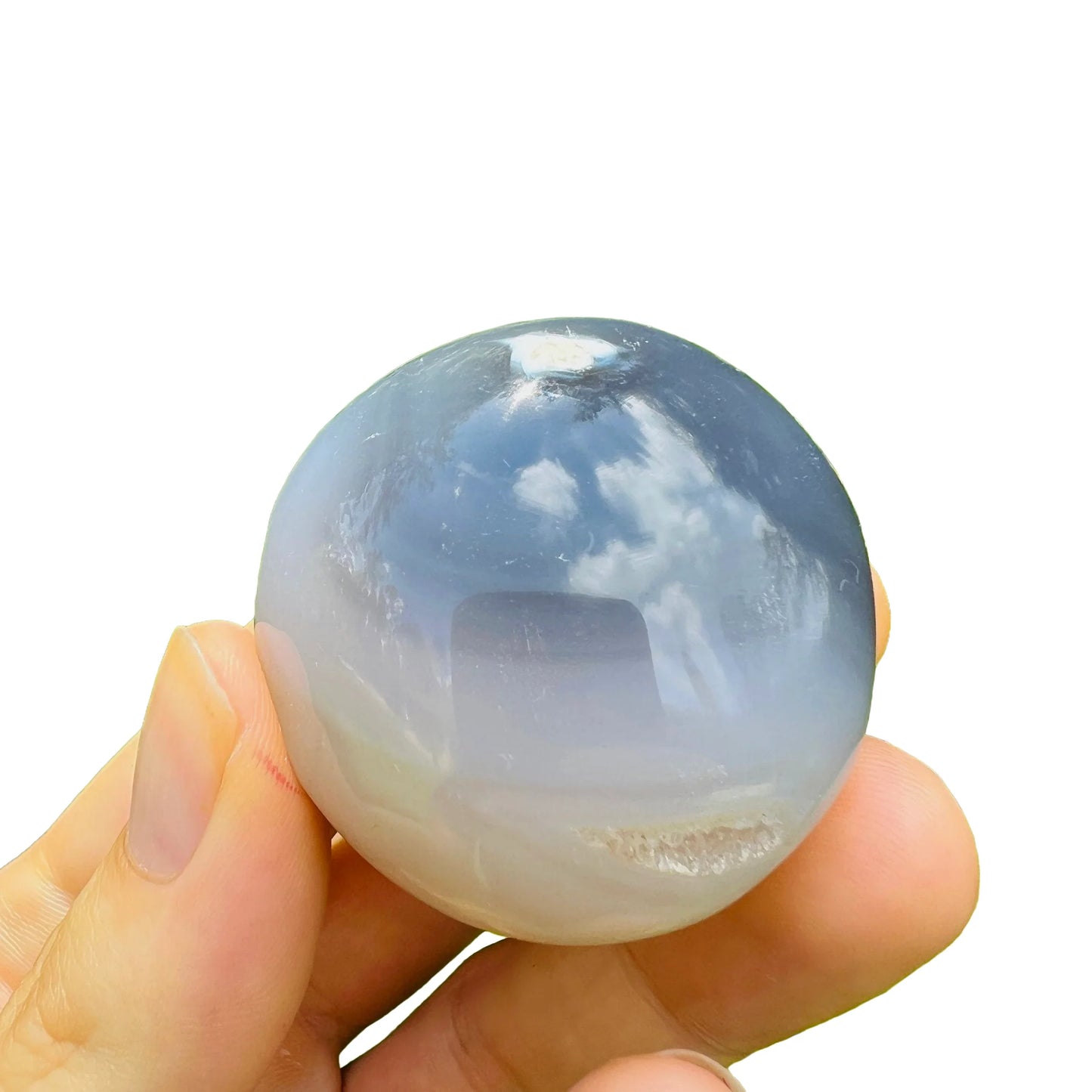 Back view of Grade AA Orca Agate palm stone showing natural surface