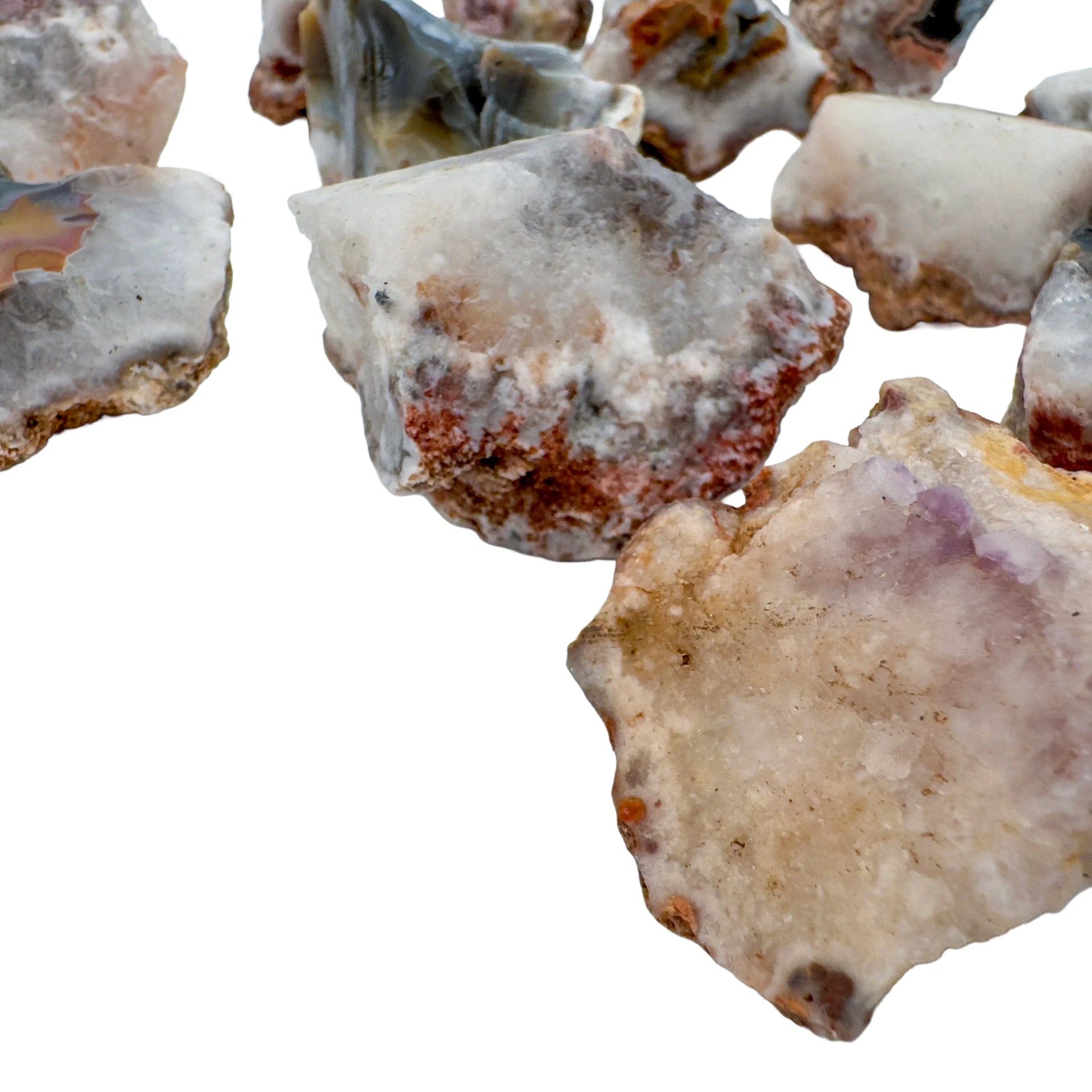 Edge view of Patagonia Agate raw stone, showing characteristic color.