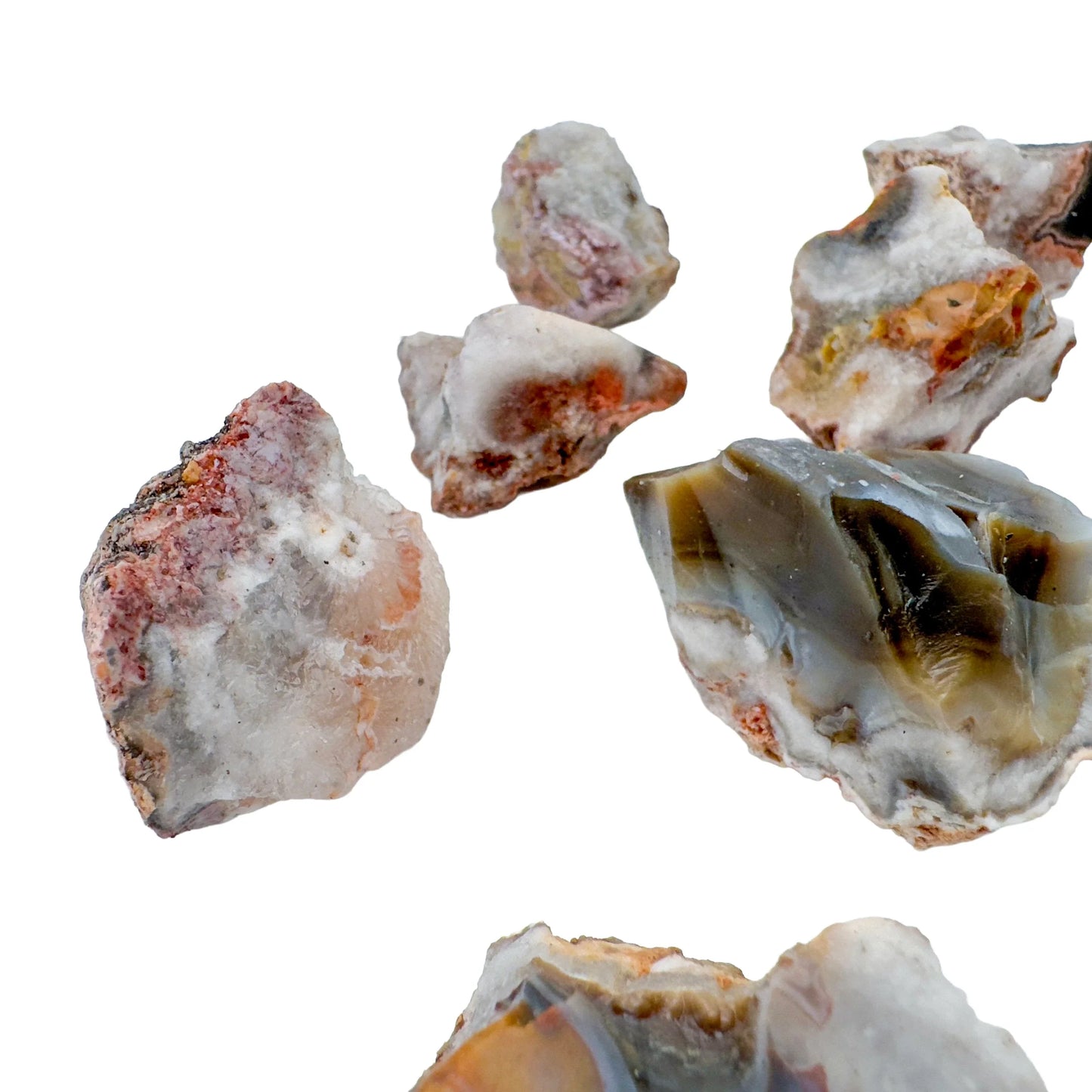 Held in hand is a Patagonia Agate raw crystal, from Río Negro Province, Argentina, traditionally used for Protection, with character of the piece on display.