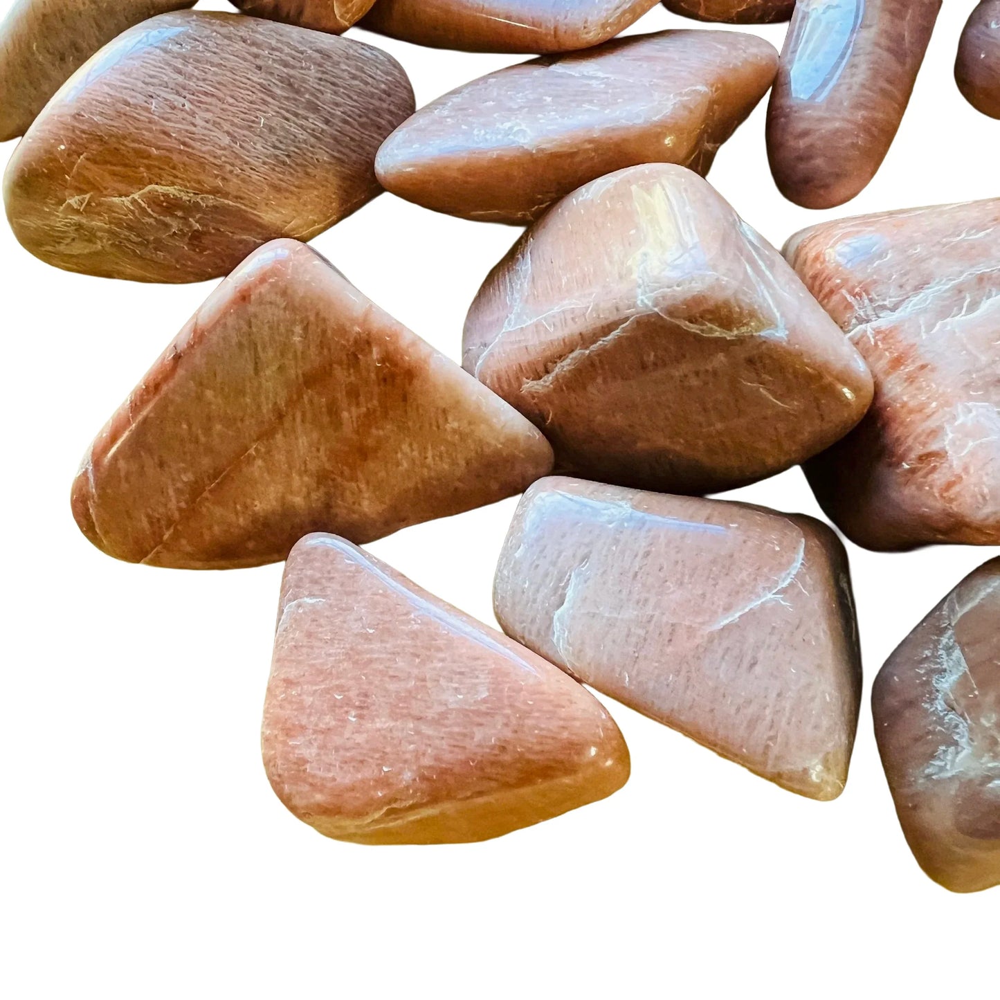 Detail of Peach Moonstone tumbled stone, showing natural variation.