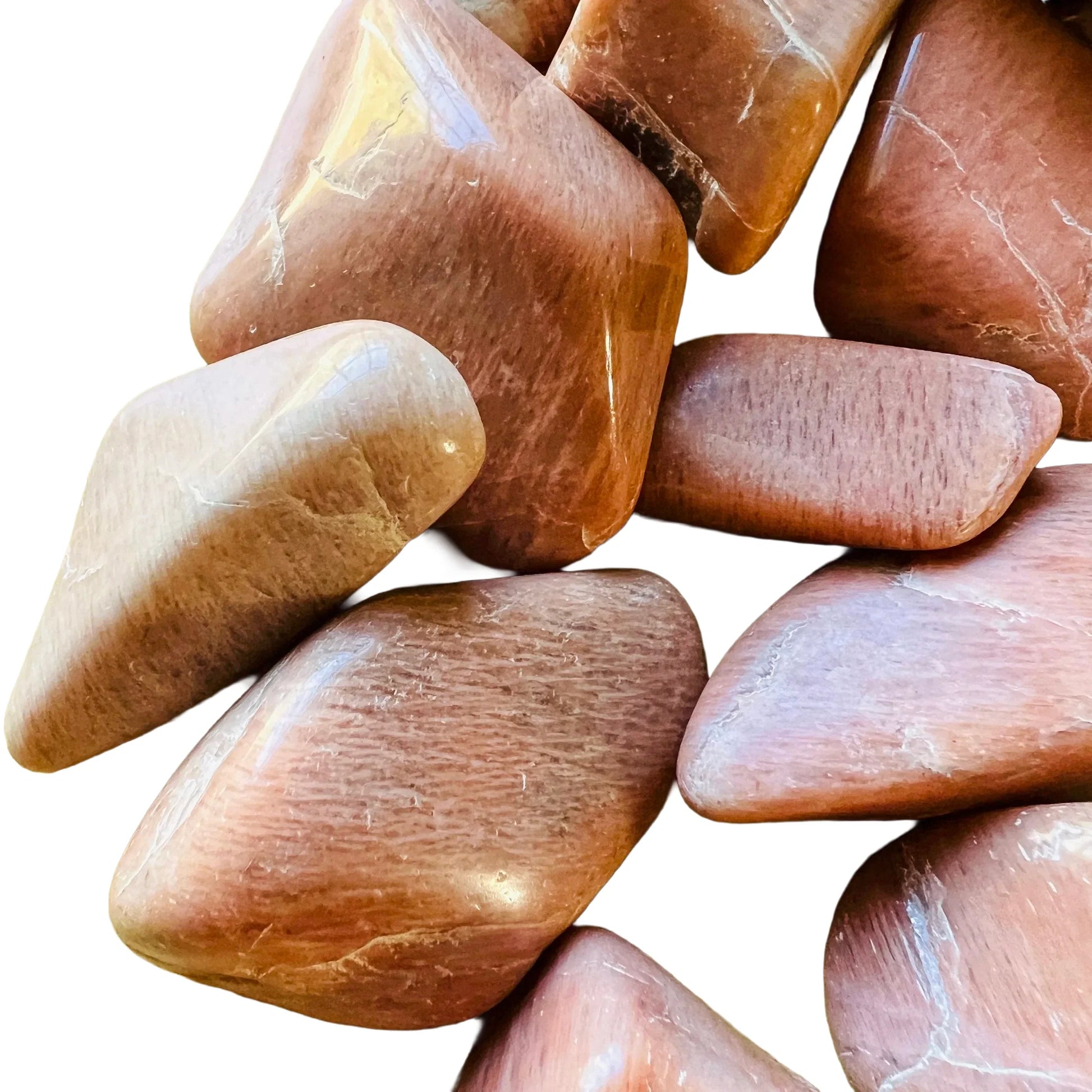 Bird's-eye view of Peach Moonstone tumbled stone, linked to Emotional Healing, sourced from Madagascar.
