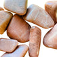 Rear view of Peach Moonstone tumbled stone, sourced from Alaotra-Mangoro, Madagascar.