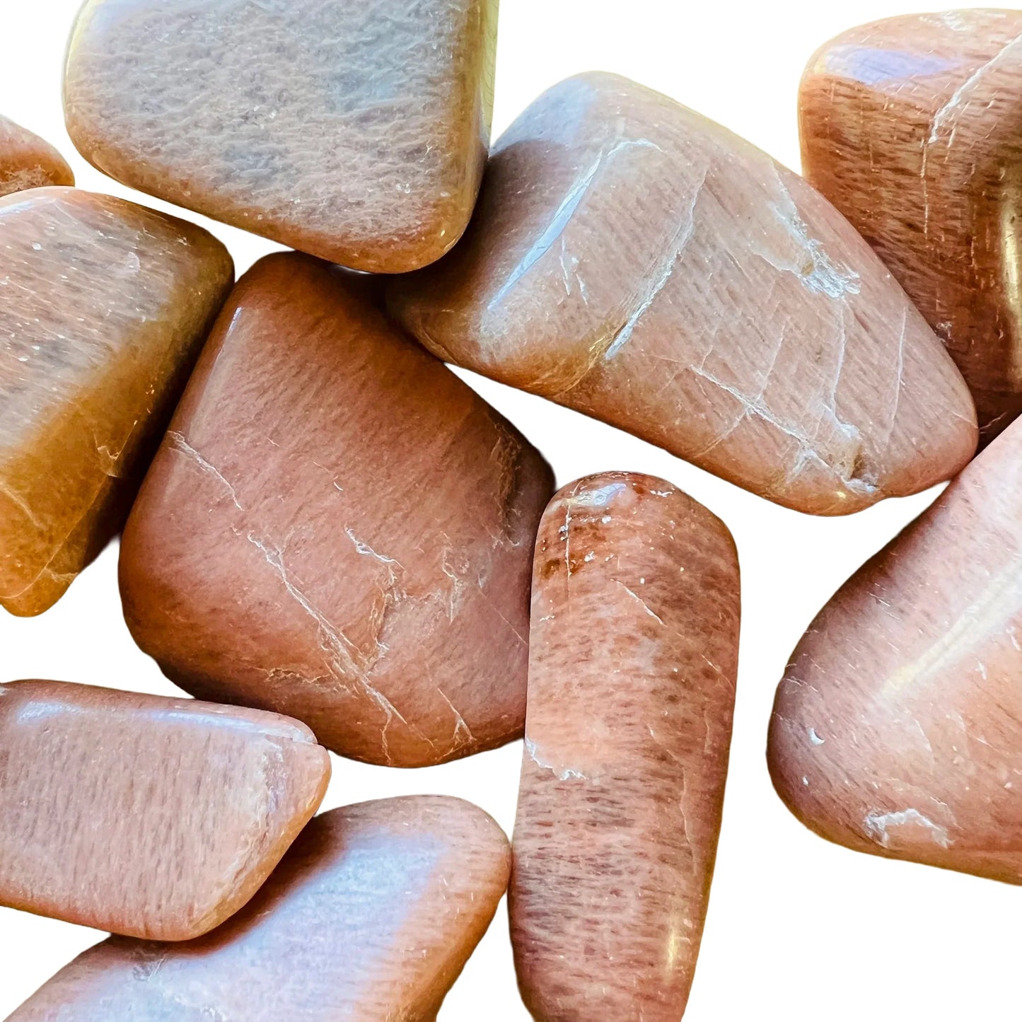 Rear view of Peach Moonstone tumbled stone, sourced from Alaotra-Mangoro, Madagascar.