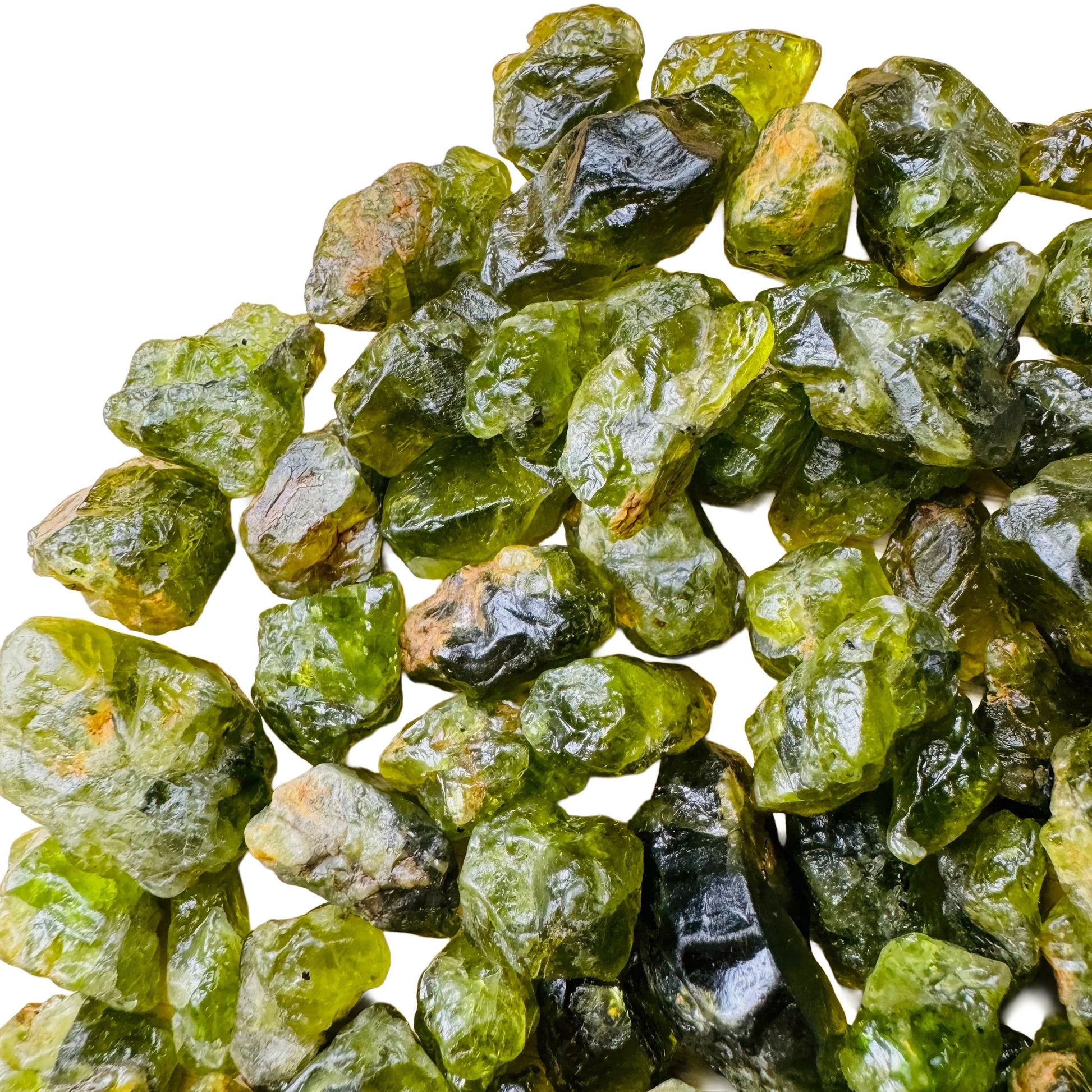Side angle of Peridot raw stone, hand-selected from San Carlos Apache Reservation, Arizona, United States.
