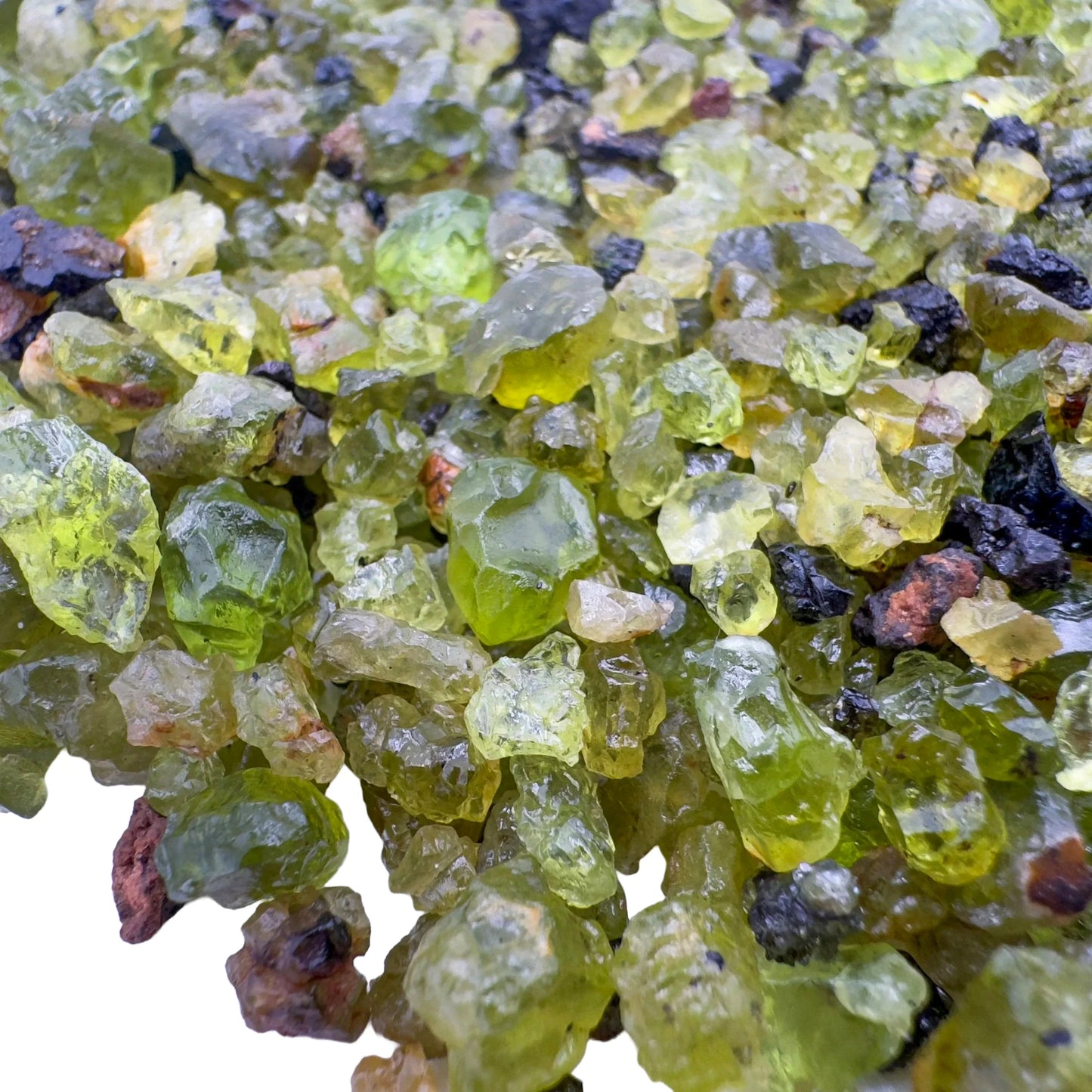 Bird's-eye view of green Peridot raw stone, from San Carlos Apache Reservation, Arizona, United States.