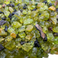 Back view of Peridot raw stone, from United States, worked with for Abundance.