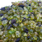 Back view of Grade AA Peridot raw showing natural surface