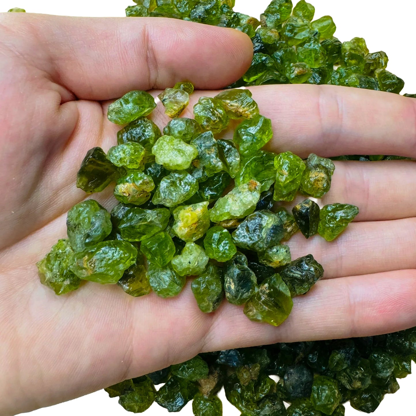 Near view of Peridot raw stone, for Abundance, showing earthy tone.