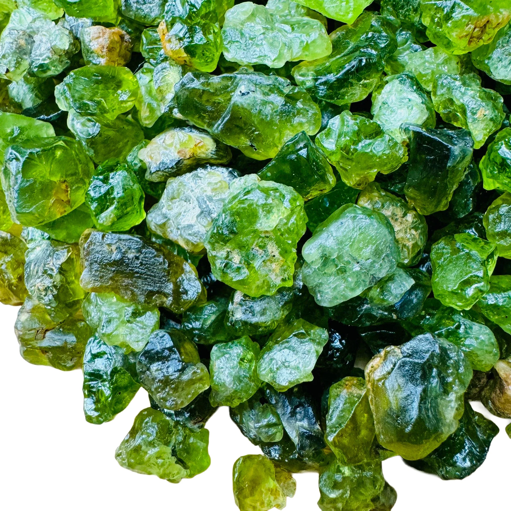 Lateral view of Peridot raw stone, showing natural color depth.