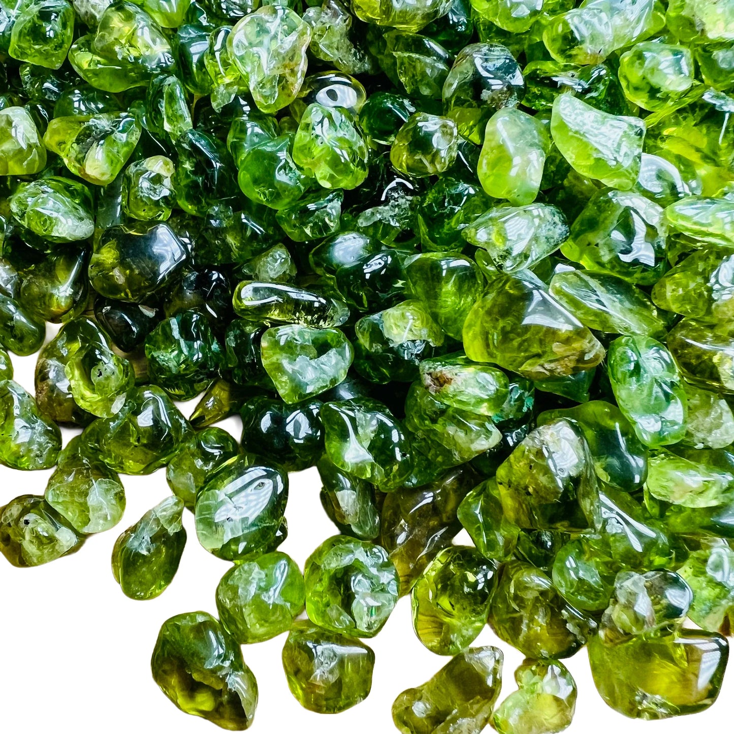 Detail of Peridot tumbled stone, showing subtle veining.