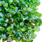 Top angle of Peridot tumbled stone, from San Carlos Apache Reservation, Arizona, United States, often paired with practices.
