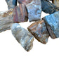 Side-on view of Grade A Petrified Wood raw stone, showing open form.
