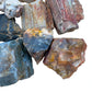 Underside view of Petrified Wood raw stone, showing natural banding, from Boeny, Madagascar.