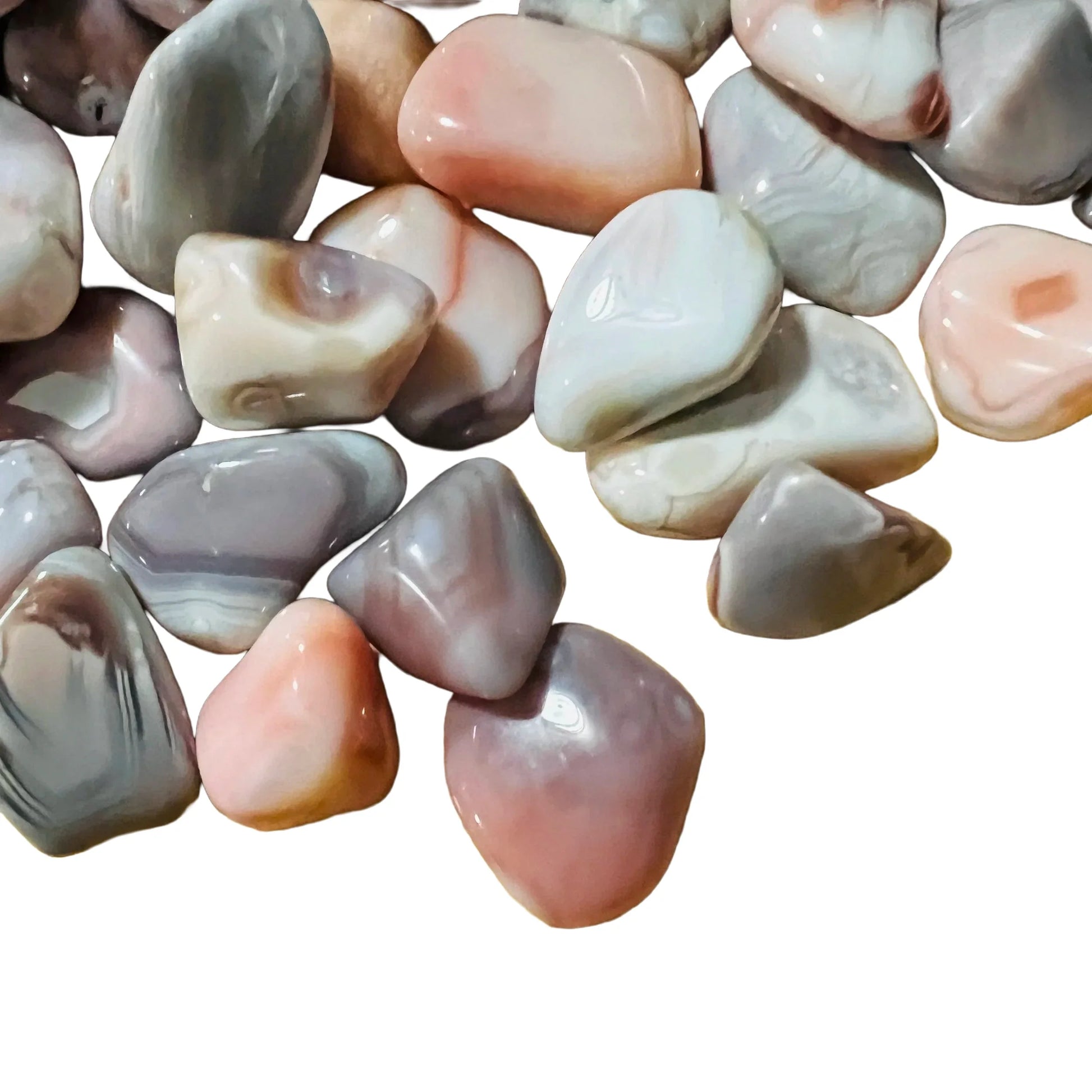 Surface detail of Pink Agate tumbled stone, kept near for Love, showing characteristic patterning.
