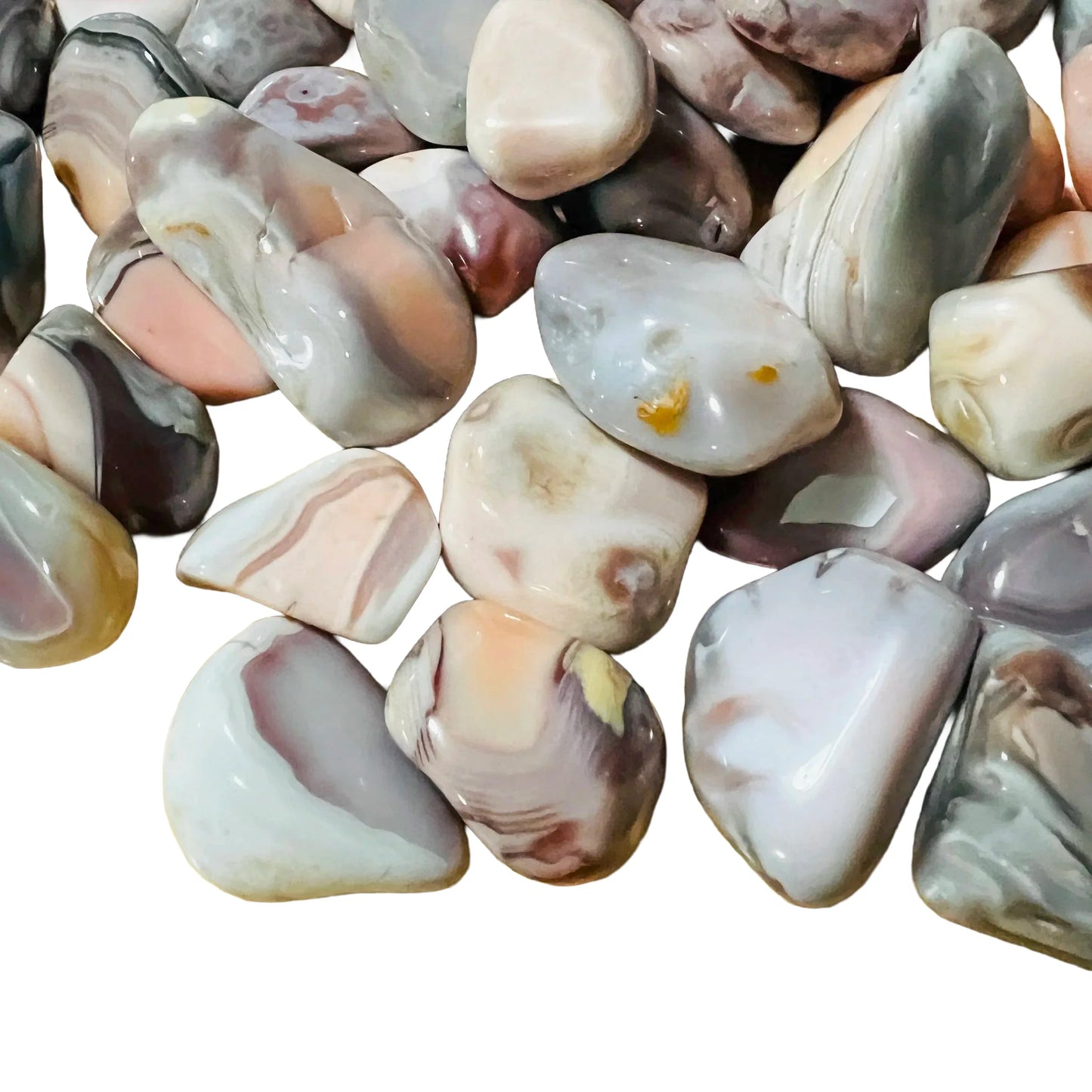 Side perspective of Pink Agate tumbled stone, showing natural texture, drawn on for Love.
