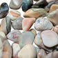 Plan view of Pink Agate tumbled stone, showing natural variation.