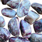 Detail of Pink Tourmaline tumbled stone, Madagascar-sourced.