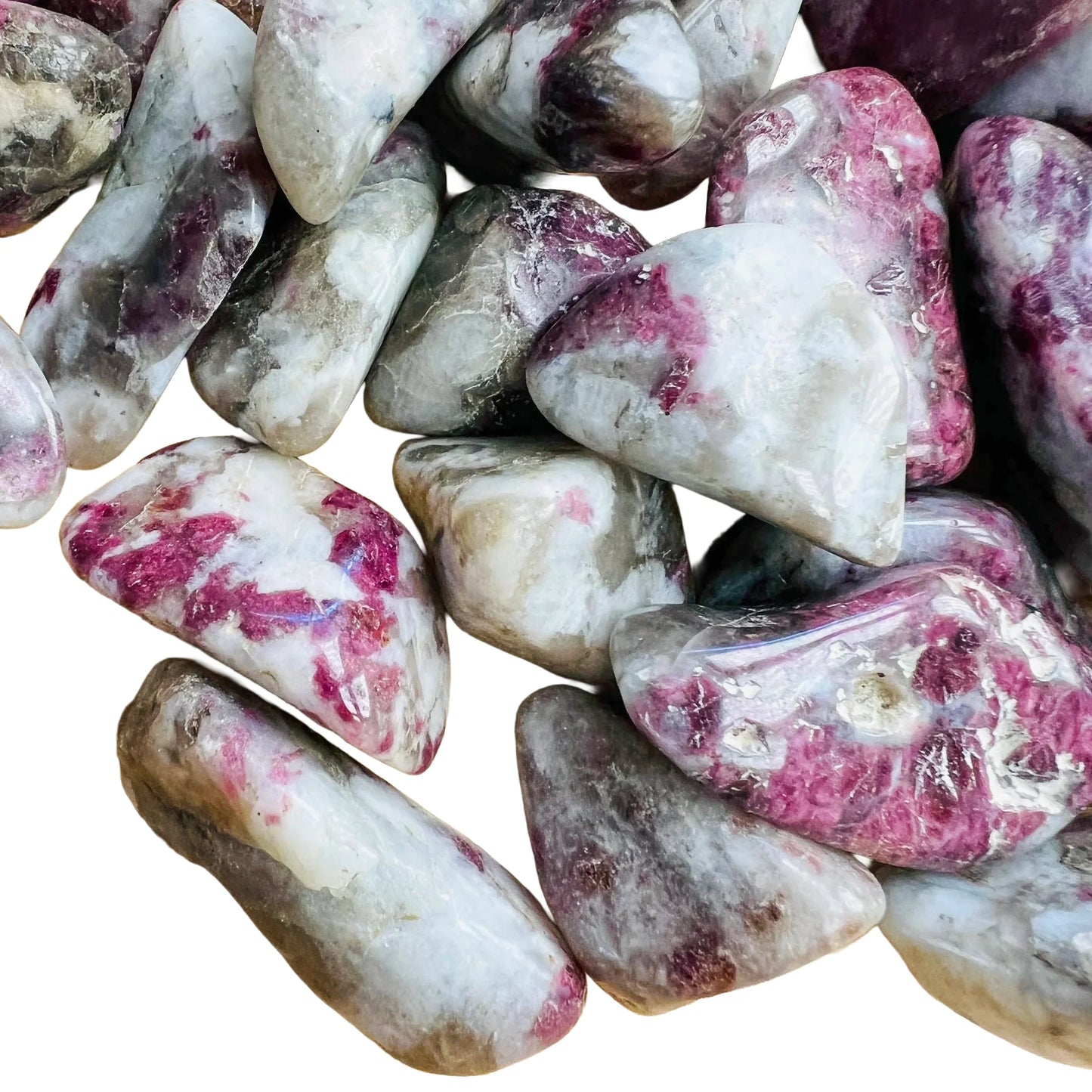 Detail shot showing Pink Tourmaline tumbled stone, Madagascar-sourced, associated with Love.