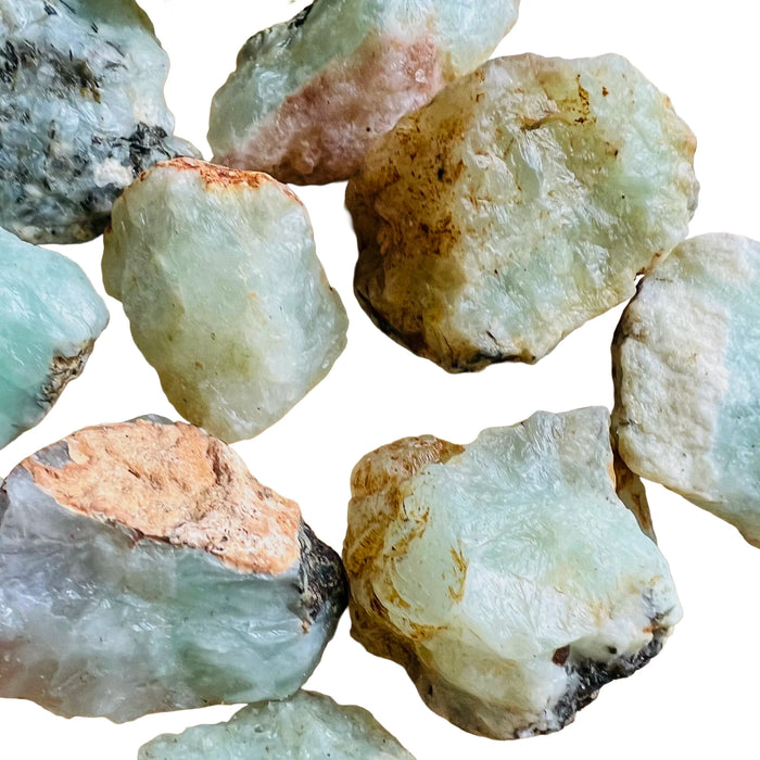 Alternate angle of green Prehnite raw stone, showing characteristic finish, from Kunene, Namibia.