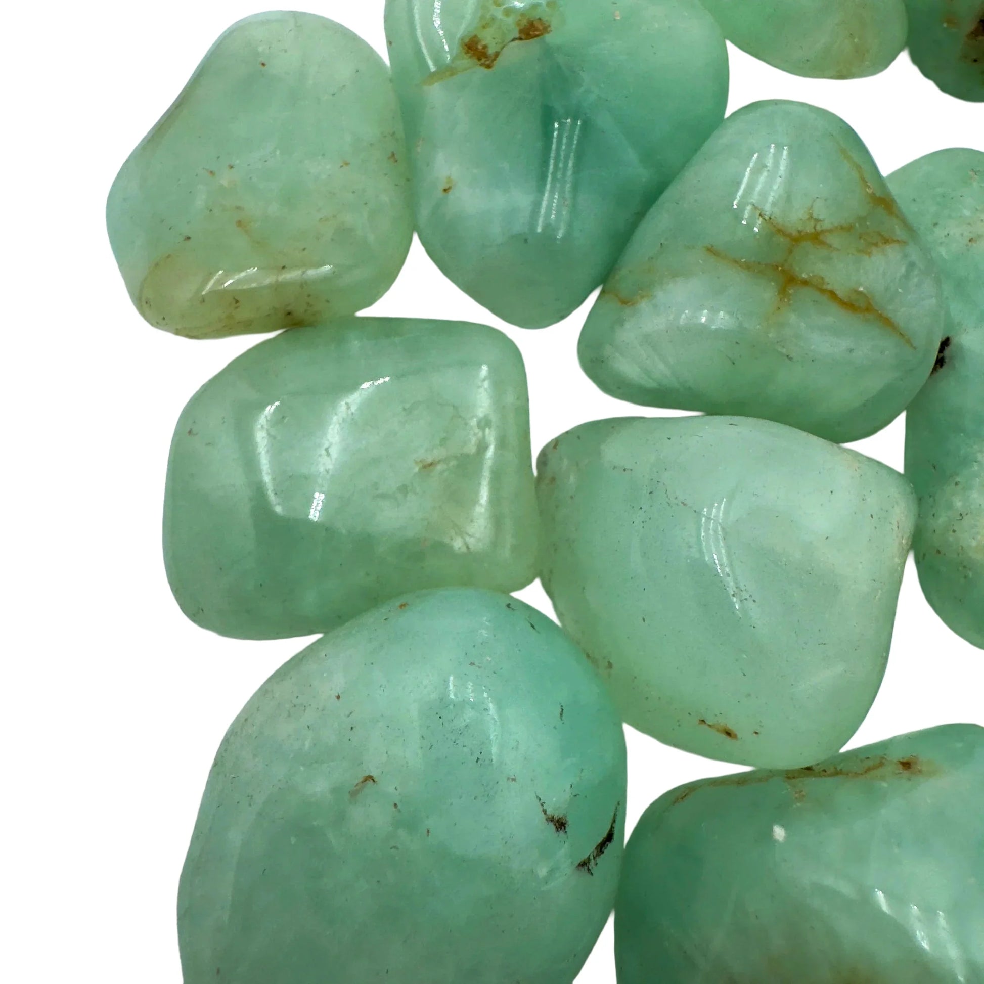 Underside view of Grade AA green Prehnite tumbled stone, showing color depth.