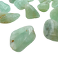 Grade AA Prehnite tumbled stones from Erongo, ideal for heart chakra meditation and emotional balance
