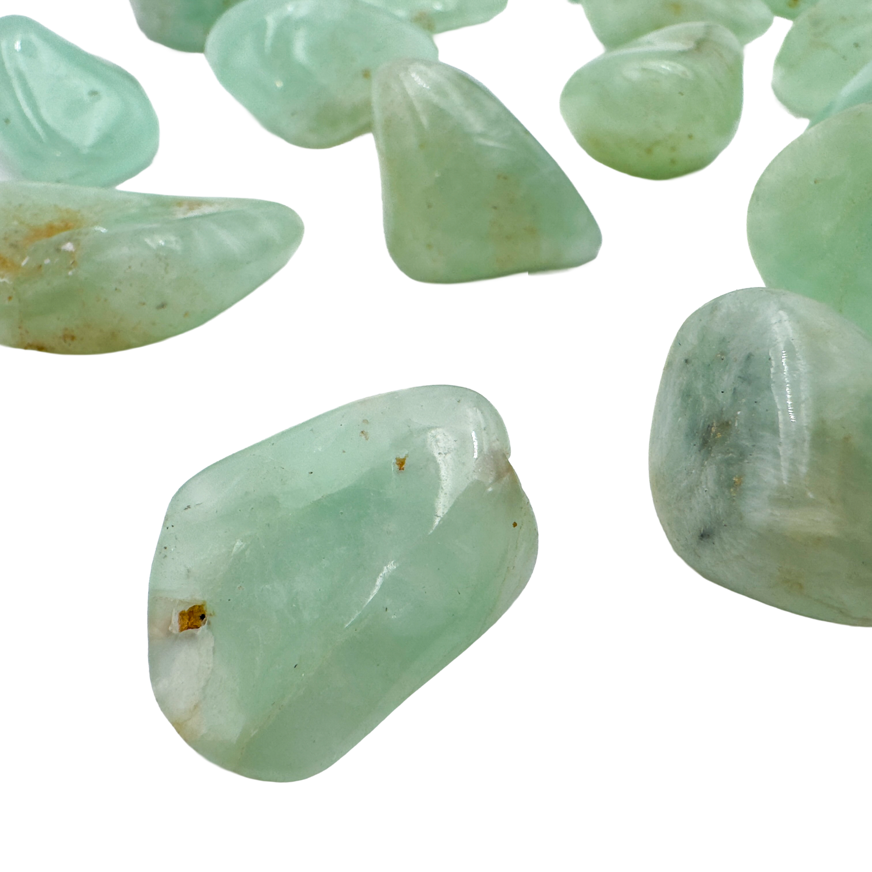 Grade AA Prehnite tumbled stones from Erongo, ideal for heart chakra meditation and emotional balance