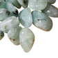 Close detail of Prehnite tumbled stone, sourced from Erongo, Namibia.