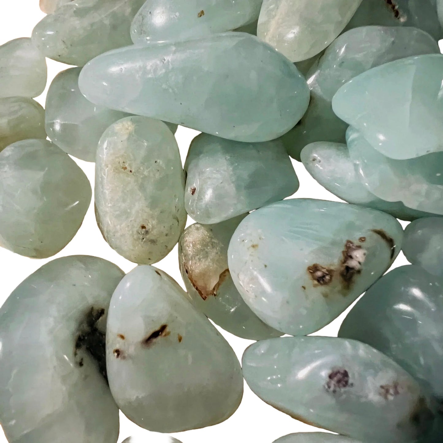 Edge-on view of Prehnite tumbled stone, showing natural sheen.