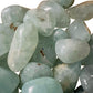 Overhead angle of Prehnite tumbled stone, to support Healing and Meditation.