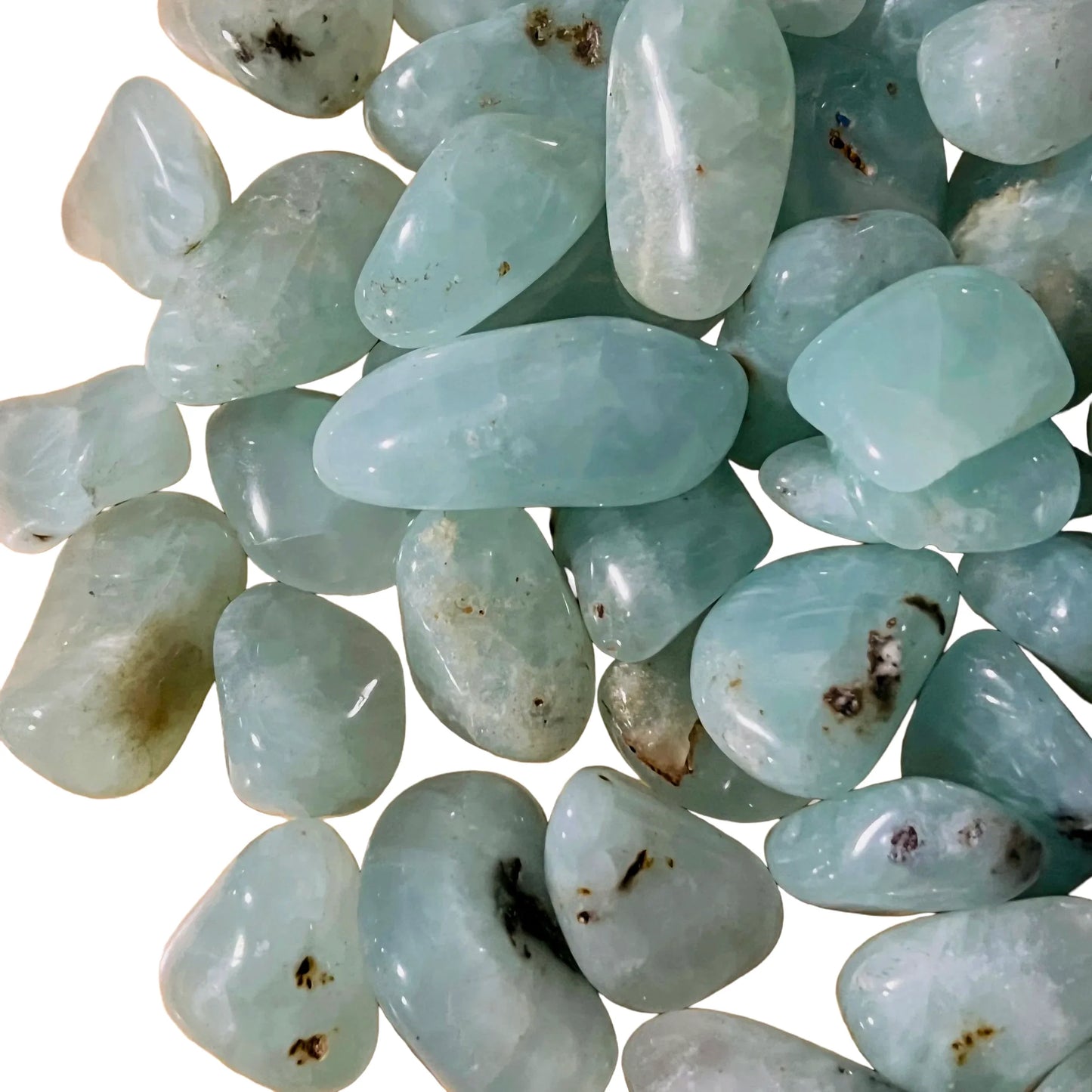 Hand-held view of a Prehnite tumbled stone, hand-selected from Erongo, Namibia.