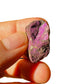 Back view of Grade A Purpurite raw showing natural surface