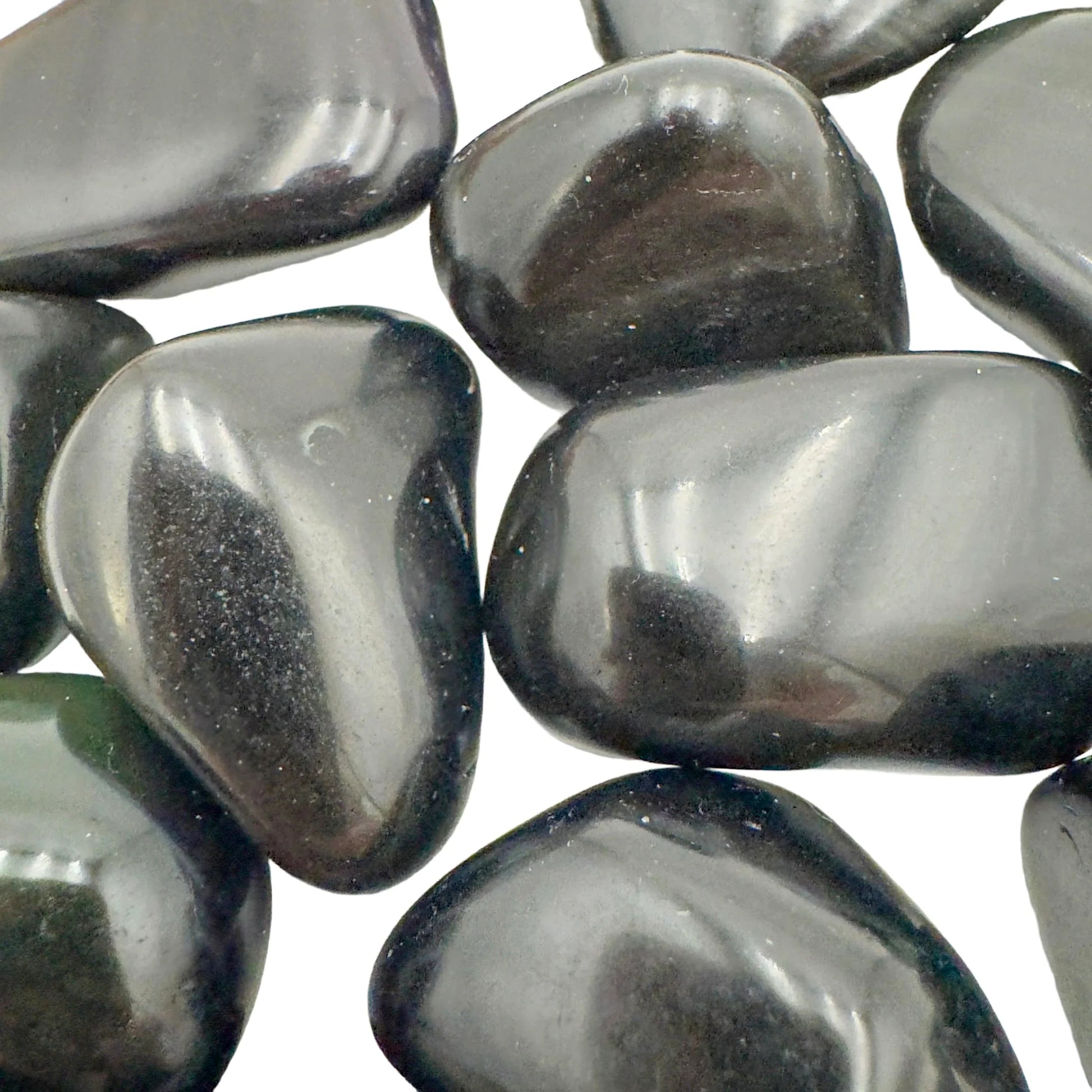 Overhead angle of black Rainbow Obsidian tumbled stone, showing subtle veining.